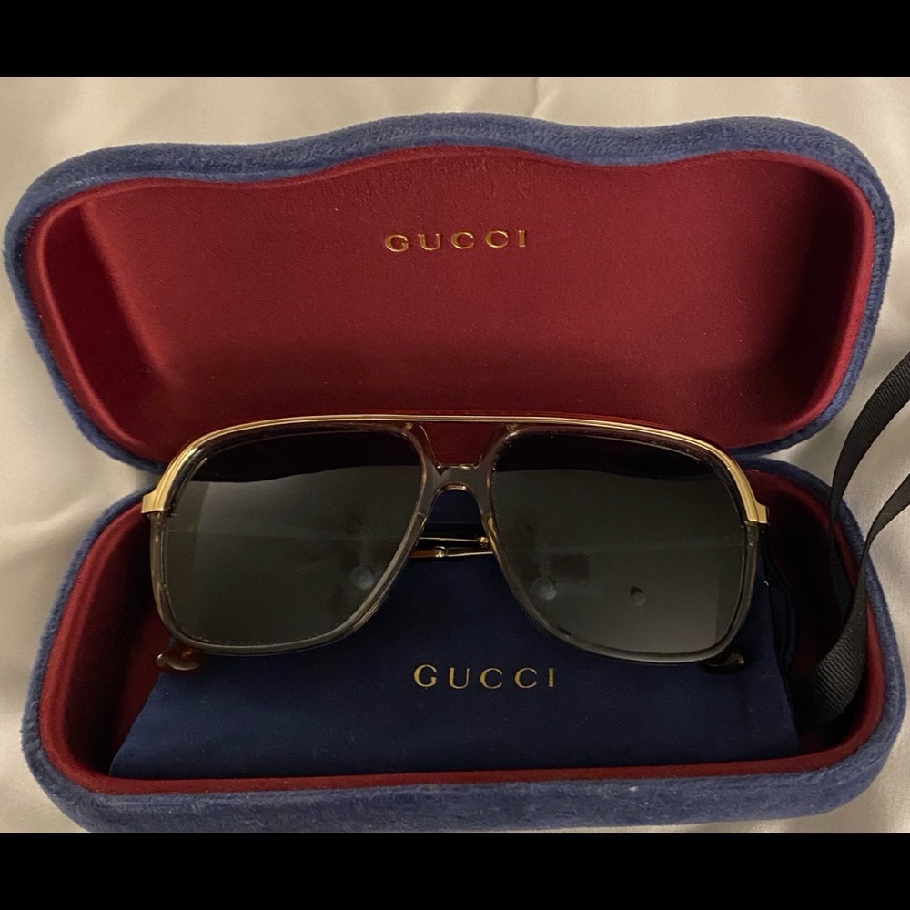 GG0137S 61, Gold/Grey. Excellent condition. Authentic Gucci with receipt.